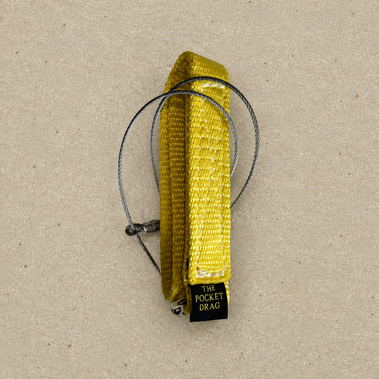 Pocket Drag with steel cable loops for moving wild hogs and game